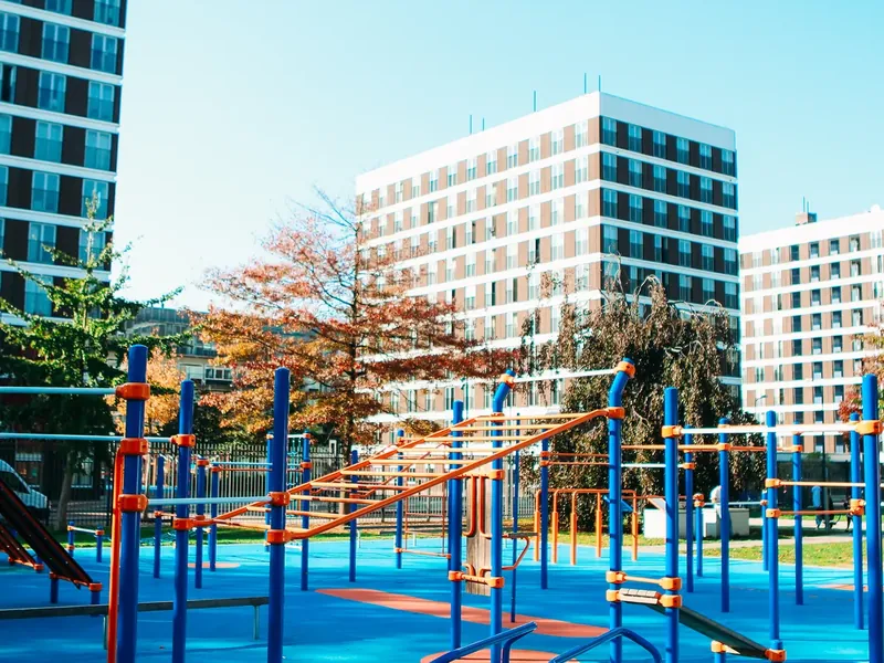 An outdoor calisthenics park with pull-up and dip bars